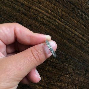 One Ladies Platinum and Diamond Band Ring